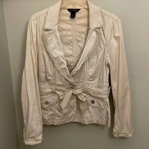 Jacket, is wrinkled from being in plastic bin